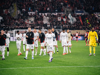 Players of AC Milan greet fans after the UEFA Champions League 2024/25 League Phase MD2 match between Bayer 04 Leverkusen and AC Milan at Ba...