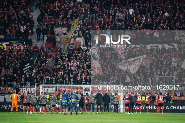 Players of Bayer 04 Leverkusen celebrate with fans after the UEFA Champions League 2024/25 League Phase MD2 match between Bayer 04 Leverkuse...