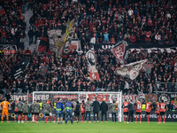 Players of Bayer 04 Leverkusen celebrate with fans after the UEFA Champions League 2024/25 League Phase MD2 match between Bayer 04 Leverkuse...