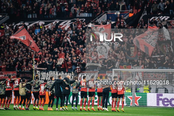 Players of Bayer 04 Leverkusen celebrate with fans after the UEFA Champions League 2024/25 League Phase MD2 match between Bayer 04 Leverkuse...