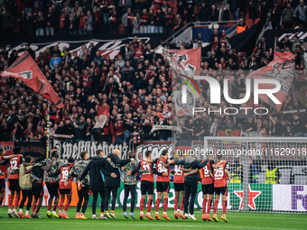 Players of Bayer 04 Leverkusen celebrate with fans after the UEFA Champions League 2024/25 League Phase MD2 match between Bayer 04 Leverkuse...