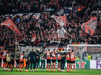 Players of Bayer 04 Leverkusen celebrate with fans after the UEFA Champions League 2024/25 League Phase MD2 match between Bayer 04 Leverkuse...