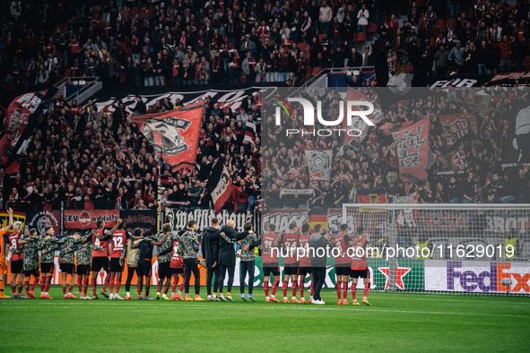 Players of Bayer 04 Leverkusen celebrate with fans after the UEFA Champions League 2024/25 League Phase MD2 match between Bayer 04 Leverkuse...