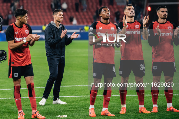 Xabi Alonso, Head Coach of Bayer 04 Leverkusen, and his players celebrate with fans after the UEFA Champions League 2024/25 League Phase MD2...