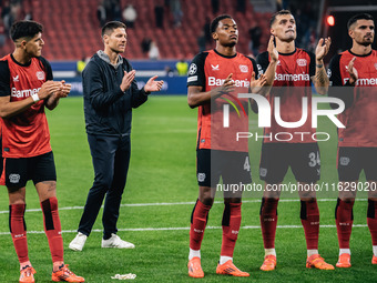 Xabi Alonso, Head Coach of Bayer 04 Leverkusen, and his players celebrate with fans after the UEFA Champions League 2024/25 League Phase MD2...