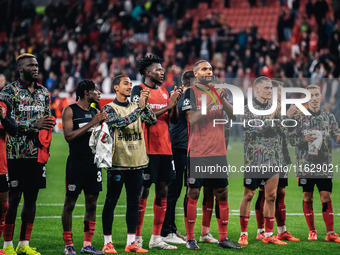 Players of Bayer 04 Leverkusen celebrate with fans after the UEFA Champions League 2024/25 League Phase MD2 match between Bayer 04 Leverkuse...