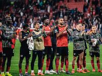 Players of Bayer 04 Leverkusen celebrate with fans after the UEFA Champions League 2024/25 League Phase MD2 match between Bayer 04 Leverkuse...