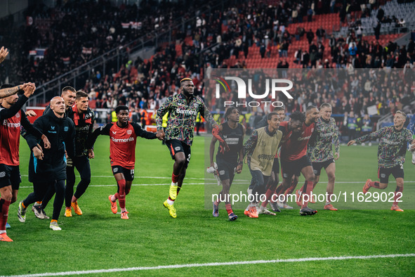 Players of Bayer 04 Leverkusen celebrate with fans after the UEFA Champions League 2024/25 League Phase MD2 match between Bayer 04 Leverkuse...