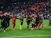 Players of Bayer 04 Leverkusen celebrate with fans after the UEFA Champions League 2024/25 League Phase MD2 match between Bayer 04 Leverkuse...