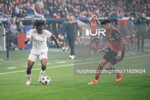 Samuel Chukwueze of AC Milan and Piero Hincapie of Bayer 04 Leverkusen are in action during the UEFA Champions League 2024/25 League Phase M...