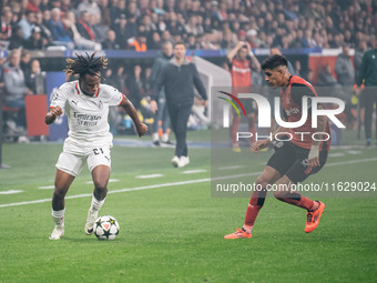 Samuel Chukwueze of AC Milan and Piero Hincapie of Bayer 04 Leverkusen are in action during the UEFA Champions League 2024/25 League Phase M...