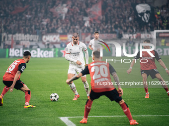 Alvaro Morata of AC Milan is in action during the UEFA Champions League 2024/25 League Phase MD2 match between Bayer 04 Leverkusen and AC Mi...