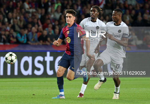 Pau Victor, Mohamed Camara, and Tanguy Banhie Zoukrou play during the match between FC Barcelona and BSC Young Boys in the week 2 of the Lea...