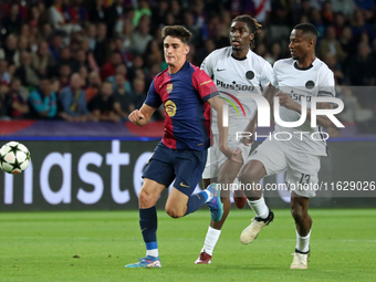 Pau Victor, Mohamed Camara, and Tanguy Banhie Zoukrou play during the match between FC Barcelona and BSC Young Boys in the week 2 of the Lea...