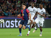 Pau Victor, Mohamed Camara, and Tanguy Banhie Zoukrou play during the match between FC Barcelona and BSC Young Boys in the week 2 of the Lea...