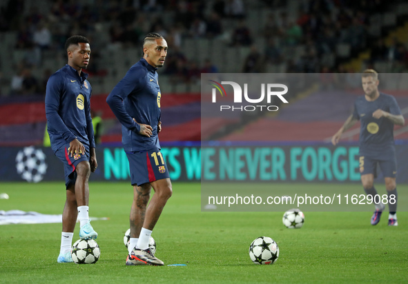 Raphinha Dias and Ansu Fati play during the match between FC Barcelona and BSC Young Boys in the week 2 of the League Stage of the UEFA Cham...