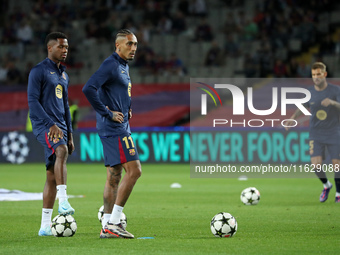 Raphinha Dias and Ansu Fati play during the match between FC Barcelona and BSC Young Boys in the week 2 of the League Stage of the UEFA Cham...