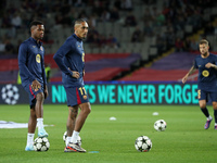 Raphinha Dias and Ansu Fati play during the match between FC Barcelona and BSC Young Boys in the week 2 of the League Stage of the UEFA Cham...