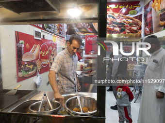 A view of a small fast-food restaurant in downtown Tehran, Iran, on October 1, 2024, after Iran's missile attack against Israel. Iran launch...