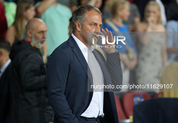 Hansi Flick coaches during the match between FC Barcelona and BSC Young Boys in the week 2 of the League Stage of the UEFA Champions League...