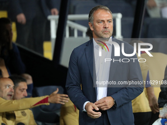 Hansi Flick coaches during the match between FC Barcelona and BSC Young Boys in the week 2 of the League Stage of the UEFA Champions League...