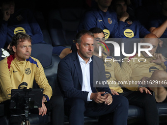 Hansi Flick coaches during the match between FC Barcelona and BSC Young Boys in the week 2 of the League Stage of the UEFA Champions League...