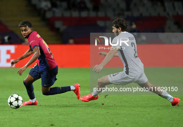 Lamine Yamal and Jaouen Hadjam play during the match between FC Barcelona and BSC Young Boys in the week 2 of the League Stage of the UEFA C...