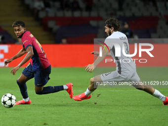 Lamine Yamal and Jaouen Hadjam play during the match between FC Barcelona and BSC Young Boys in the week 2 of the League Stage of the UEFA C...