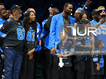 DETROIT,MICHIGAN-September 30: Former Detroit Lions wide receiver Calvin (“Megatron”) Johnson Jr. attends the ceremony honoring his inductio...