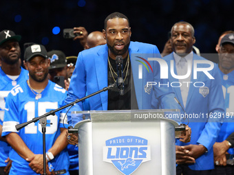 DETROIT,MICHIGAN-September 30: Former Detroit Lions player Calvin Johnson Jr. speaks during the ceremony honoring his induction to the Pride...