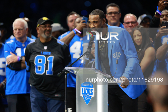 DETROIT,MICHIGAN-September 30: Former Detroit Lions player Calvin Johnson Jr. speaks during the ceremony honoring his induction to the Pride...