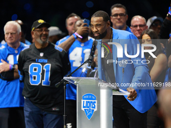 DETROIT,MICHIGAN-September 30: Former Detroit Lions player Calvin Johnson Jr. speaks during the ceremony honoring his induction to the Pride...