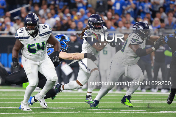 DETROIT,MICHIGAN-September 30: Seattle Seahawks wide receiver Laviska Shenault Jr. (1) runs the ball against Detroit Lions defensive end Aid...