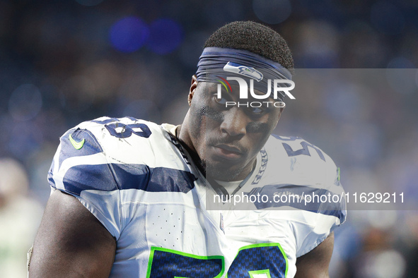 DETROIT,MICHIGAN-September 30: Seattle Seahawks linebacker Derick Hall (58) walks off the field after the conclusion of an NFL football game...