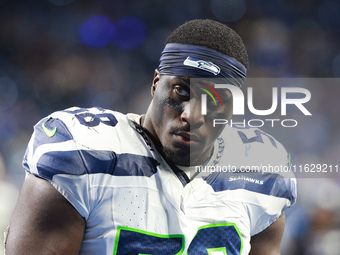 DETROIT,MICHIGAN-September 30: Seattle Seahawks linebacker Derick Hall (58) walks off the field after the conclusion of an NFL football game...