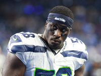 DETROIT,MICHIGAN-September 30: Seattle Seahawks linebacker Derick Hall (58) walks off the field after the conclusion of an NFL football game...