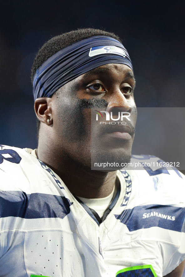 DETROIT,MICHIGAN-September 30: Seattle Seahawks linebacker Derick Hall (58) walks off the field after the conclusion of an NFL football game...