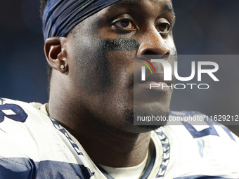 DETROIT,MICHIGAN-September 30: Seattle Seahawks linebacker Derick Hall (58) walks off the field after the conclusion of an NFL football game...