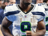 DETROIT,MICHIGAN-September 30: Seattle Seahawks running back Kenneth Walker III (9) walks off the field after the conclusion of an NFL footb...