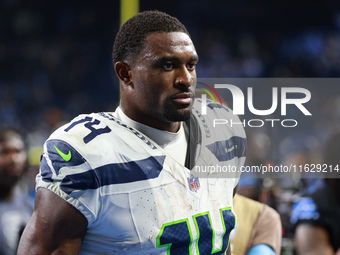 DETROIT,MICHIGAN-September 30: Seattle Seahawks wide receiver DK Metcalf (14) walks off the field after the conclusion of an NFL football ga...