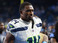 DETROIT,MICHIGAN-September 30: Seattle Seahawks wide receiver DK Metcalf (14) walks off the field after the conclusion of an NFL football ga...