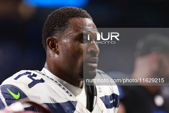 DETROIT,MICHIGAN-September 30: Seattle Seahawks wide receiver DK Metcalf (14) walks off the field after the conclusion of an NFL football ga...