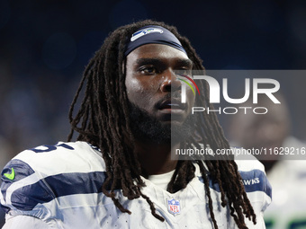 DETROIT,MICHIGAN-September 30: Seattle Seahawks defensive end Myles Adams (95) walks off the field after the conclusion of an NFL football g...