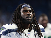 DETROIT,MICHIGAN-September 30: Seattle Seahawks defensive end Myles Adams (95) walks off the field after the conclusion of an NFL football g...