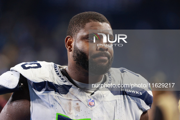 DETROIT,MICHIGAN-September 30: Seattle Seahawks guard Laken Tomlinson (70) walks off the field after the conclusion of an NFL football game...