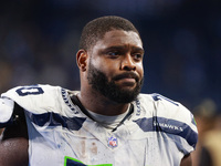 DETROIT,MICHIGAN-September 30: Seattle Seahawks guard Laken Tomlinson (70) walks off the field after the conclusion of an NFL football game...