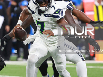 DETROIT,MICHIGAN-September 30: Seattle Seahawks quarterback Geno Smith (7) runs the ball during the first half of an NFL football game betwe...