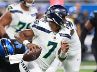 DETROIT,MICHIGAN-September 30: Seattle Seahawks quarterback Geno Smith (7) runs the ball during the first half of an NFL football game betwe...