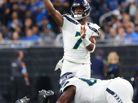 DETROIT,MICHIGAN-September 30: Seattle Seahawks quarterback Geno Smith (7) throws a pass during the first half of an NFL football game betwe...