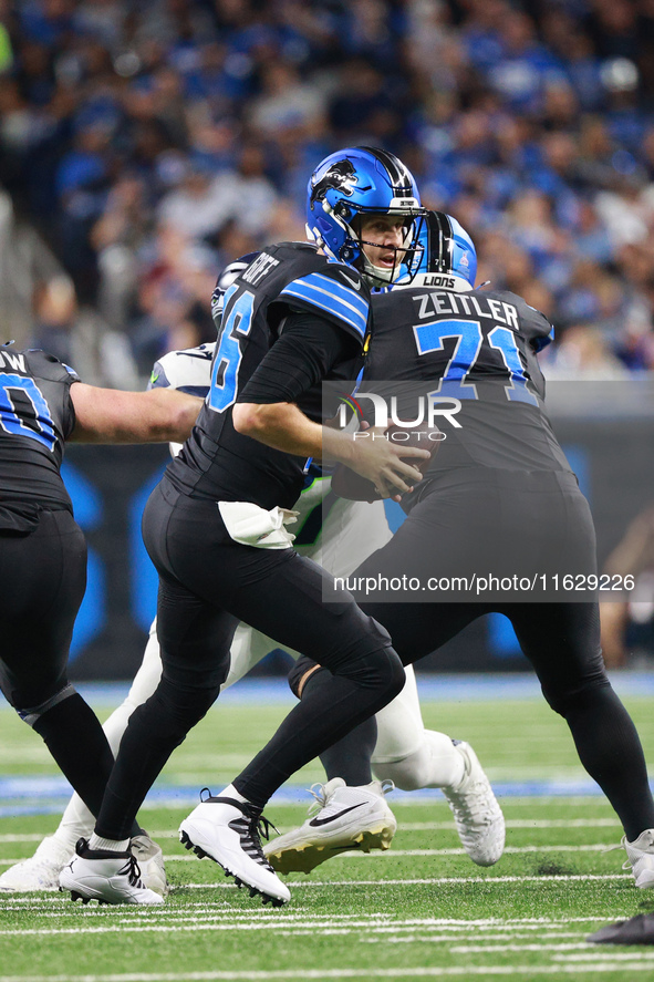 DETROIT,MICHIGAN-September 30: Detroit Lions quarterback Jared Goff (16) looks to pass during the first half of an NFL football game between...